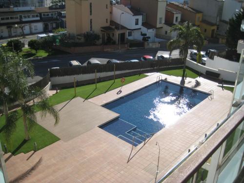Luminoso apartamento con piscina