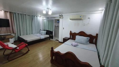 Katil atau katil-katil dalam bilik di GEN B Hotel