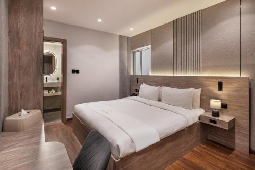 Postel nebo postele na pokoji v ubytování Regency Inn