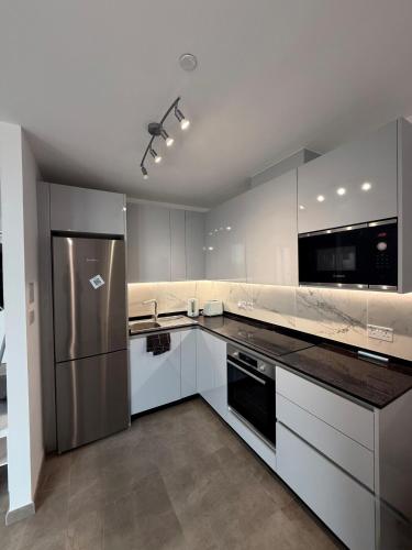 Cuina o zona de cuina de E1, Apartment