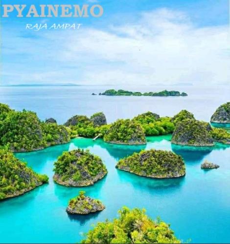 an island group of islands in the water at Beser Bay Homestay in Besir