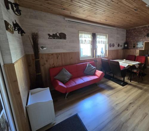 Posezení v ubytování Ferienwohnung Ilka's Lodge