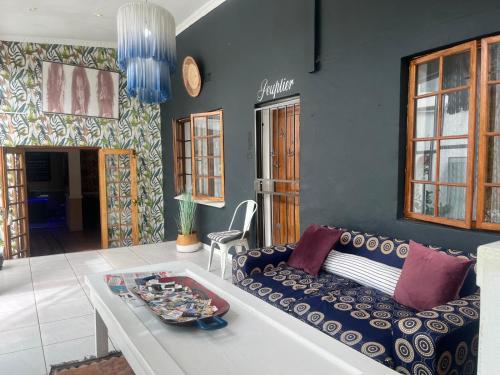 Zona de estar de Muco Guest House