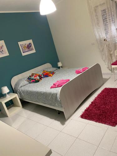 Ένα ή περισσότερα κρεβάτια σε δωμάτιο στο B&B Delle Zolfare