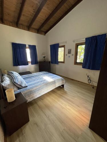 Katil atau katil-katil dalam bilik di Villa Jarabacoa Monte Bonito