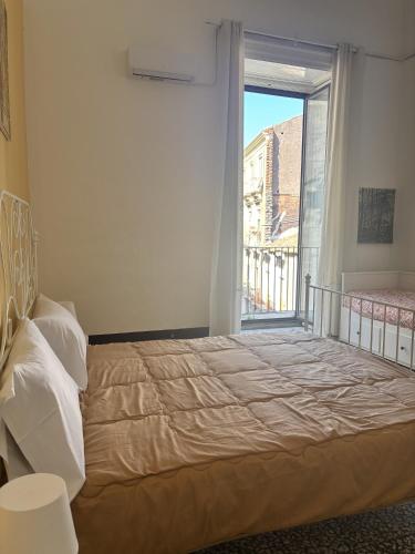 Letto o letti in una camera di Il Teatro Rooms