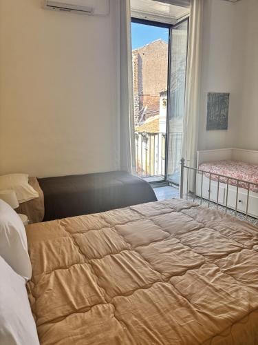 Letto o letti in una camera di Il Teatro Rooms