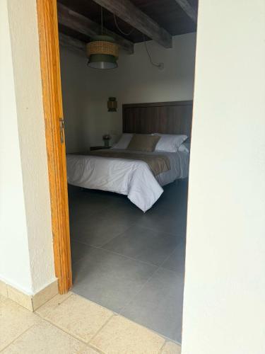 a view of a bedroom with two beds at Cazorla Estelar in Cazorla