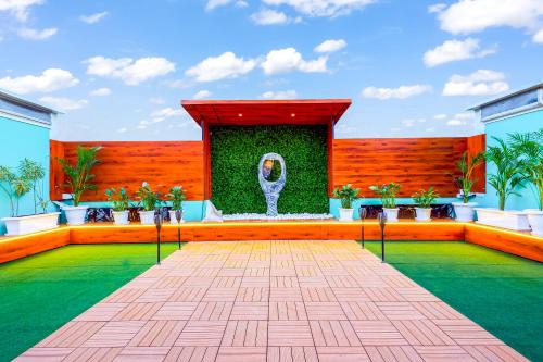 a courtyard with a fountain in a building at MyOtel - Santacruz in Mumbai