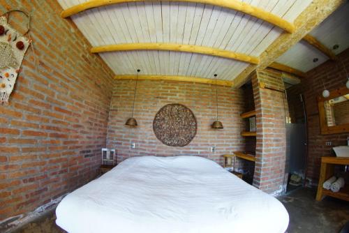 Postel nebo postele na pokoji v ubytování Casa de Campo- François Lurton