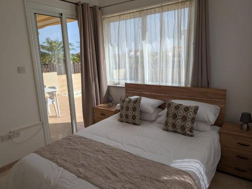 Ένα ή περισσότερα κρεβάτια σε δωμάτιο στο St Andrews Apartment