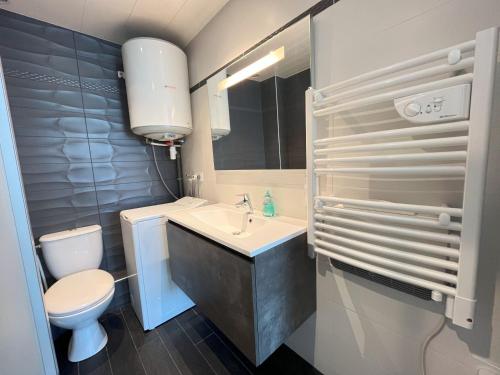 Koupelna v ubytování Studio 2 personnes proche mer et thalasso