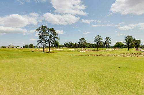 a view of the green at the golf course at Pinehurst Lake Condo Water View and Community Perks in Pinehurst