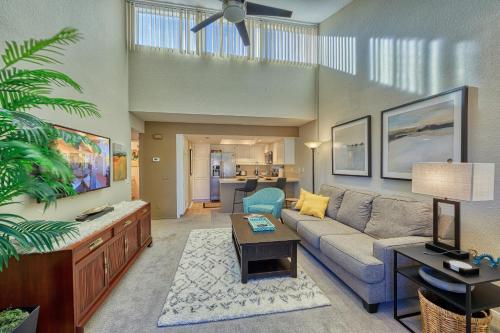 a living room with a couch and a table at The Deauville Gem in Palm Springs