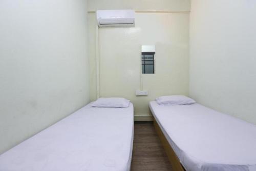 Katil atau katil-katil dalam bilik di Hotel O The Space Inn