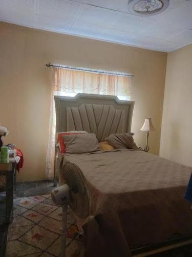 Llit o llits en una habitació de Local Vybz