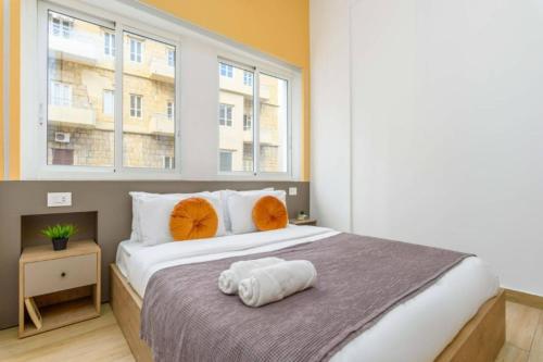 Ένα ή περισσότερα κρεβάτια σε δωμάτιο στο The Hall 2BR Gemmayze