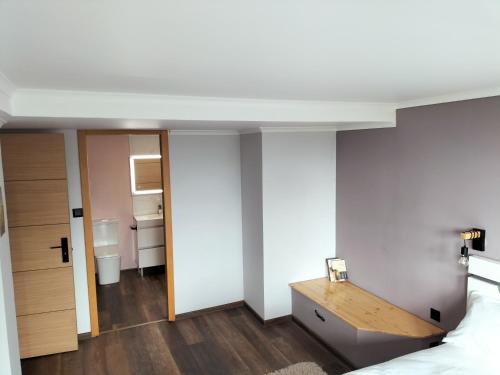 Postel nebo postele na pokoji v ubytování Casa da madeira