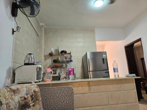 Kuchyň nebo kuchyňský kout v ubytování Blue lagoon 2 bed room apartment, AC for rent in ras sidr If you love calm this is for you 2 days minimum FAMILY only please