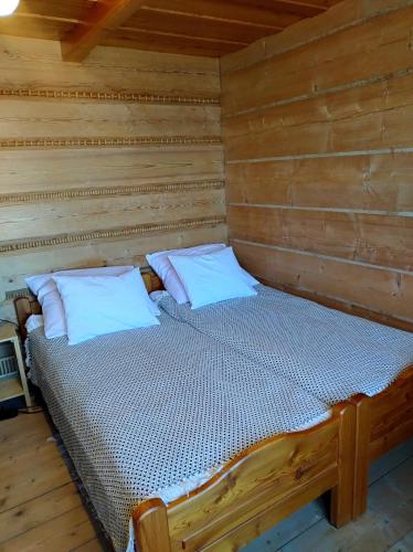 Postel nebo postele na pokoji v ubytování Halne Izby - Pokoje Gościnne
