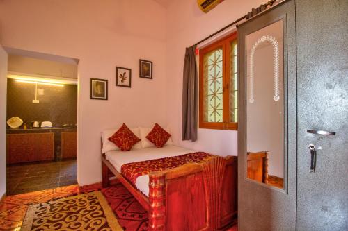 Postel nebo postele na pokoji v ubytování Anjuna Beach Villa