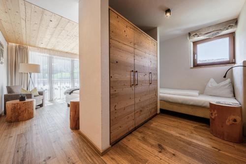 Ένα ή περισσότερα κρεβάτια σε δωμάτιο στο Hotel Stoeres - Active wellbeing