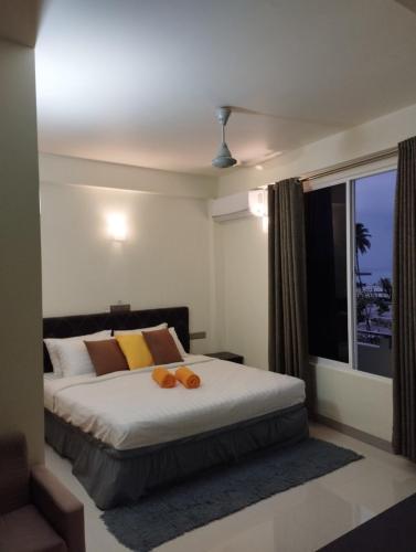 Oren Hotel Maldivesにあるベッド