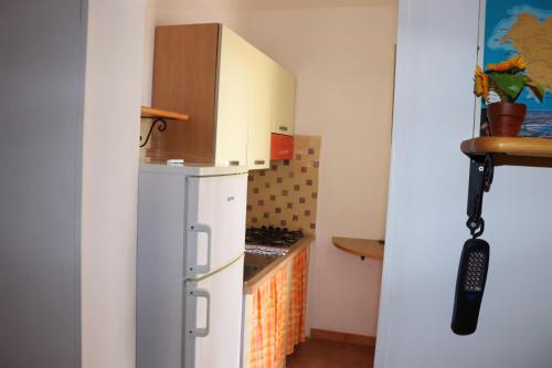 Kuchyň nebo kuchyňský kout v ubytování Casa Oasi Verde Dammuso immerso nel verde