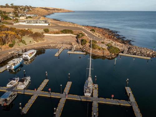 an aerial view of a marina with boats in the water at Cove Landing Marina Apartment 2 SS James Comrie Sleeps 4 in Penneshaw