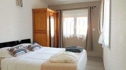 Letto o letti in una camera di BANDOL TYPE 2 AVEC TERRASSE et PARKING