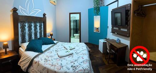 Postel nebo postele na pokoji v ubytování POUSADA NATIVA