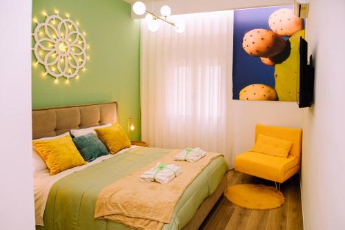 Ένα ή περισσότερα κρεβάτια σε δωμάτιο στο Piazza Mazzini Dolce Vita Suites