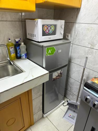 Una cocina o zona de cocina en Bliss Home Residence