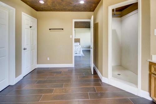 a hallway of a home with a tile floor at 8 Mi to Kemah Boardwalk Texas Gulf Home with Patio in Dickinson
