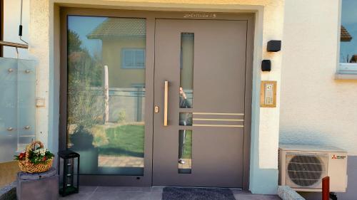 a front door of a house with a door with glass at Moderne Wohnung in Achern, Schwarzwald in Achern