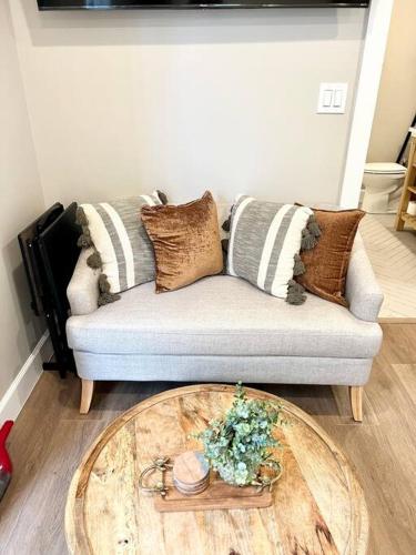 a living room with a couch and a coffee table at Lovely Studio In Downtown Stuart - Renovated #6 in Stuart
