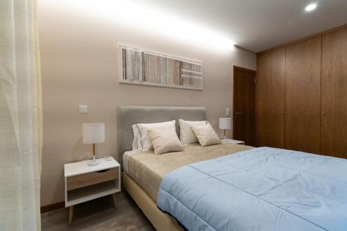 Ένα ή περισσότερα κρεβάτια σε δωμάτιο στο Encanto do Douro Antigo