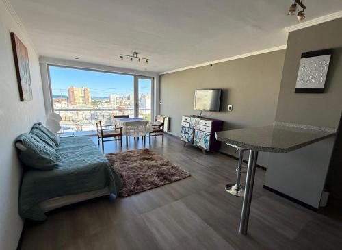Posezení v ubytování Departamento céntrico y moderno en Comodoro - Mooi Apart