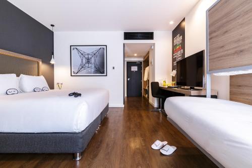 Postel nebo postele na pokoji v ubytování INNSiDE by Meliá Lima Miraflores