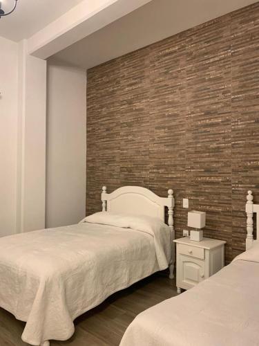 Ένα ή περισσότερα κρεβάτια σε δωμάτιο στο Hotel Y Villas el Encuentro