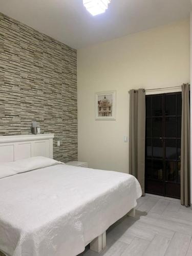 Ένα ή περισσότερα κρεβάτια σε δωμάτιο στο Hotel Y Villas el Encuentro