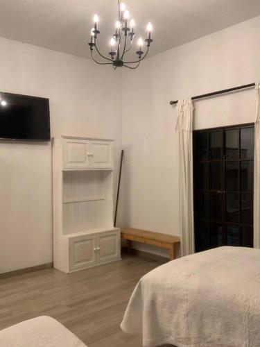 Ένα ή περισσότερα κρεβάτια σε δωμάτιο στο Hotel Y Villas el Encuentro