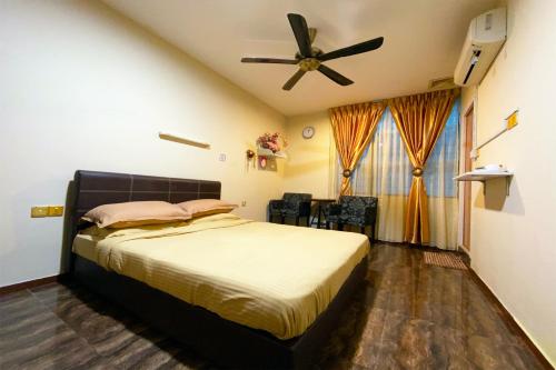 Katil atau katil-katil dalam bilik di Hotel O Rebecca's Homes