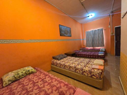 Gallery image of Hotel O Kamal Guest House Marang in Kampong Kijing