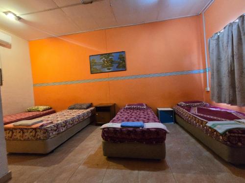 Gallery image of Hotel O Kamal Guest House Marang in Kampong Kijing