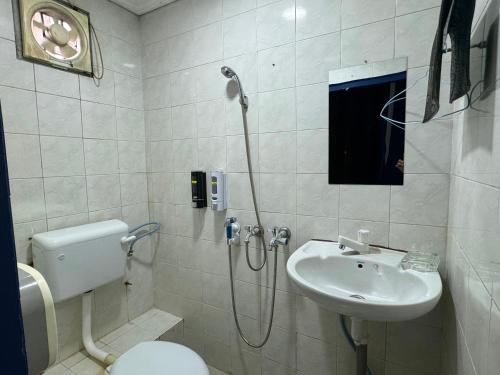 Ванная комната в Hotel O Vaigan Hotel