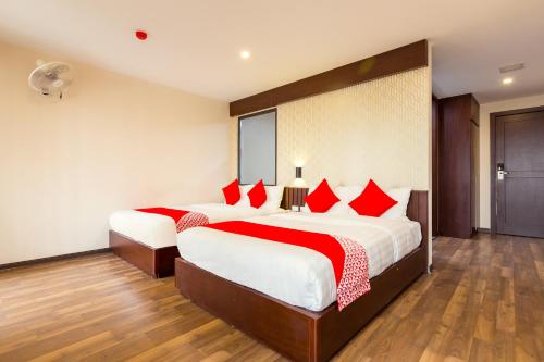 Katil atau katil-katil dalam bilik di OYO 930 Thang Long Hotel