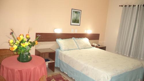 Ένα ή περισσότερα κρεβάτια σε δωμάτιο στο Villa Verde Hotel