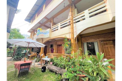 Zahrada ubytování OYO 876 Escurel Inn Boracay