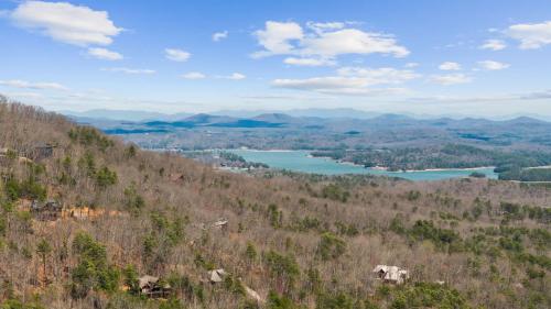 a view of a lake from the top of a hill at Mtn Views Sleeps 8 Hot Tub Game Room Fireplace in Blue Ridge